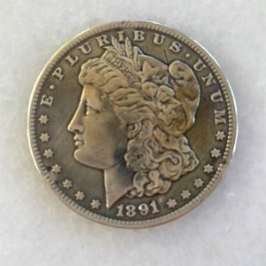 1891 Morgan silver dollar